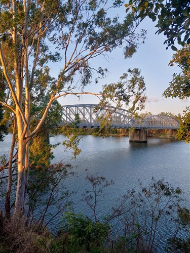 The historic Alexandra Railway Bridge crossing the Fitzroy River at dusk