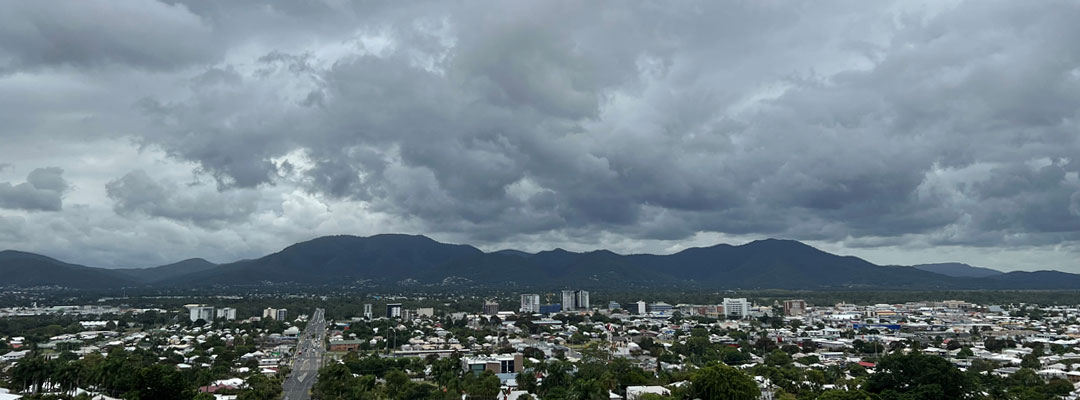 An aerial view of Rockhampton City with storm clouds forming over Mount Archer